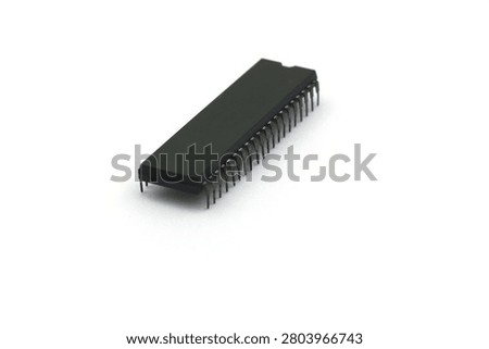 A blurry microcontroller on a white background. An archaic concept of technological advancement.
