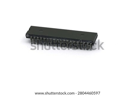 A blurry microcontroller on a white background. An archaic concept of technological advancement.