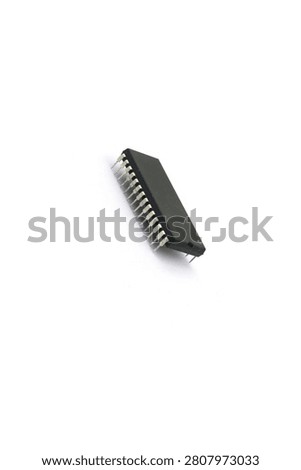 A blurry microcontroller on a white background. An archaic concept of technological advancement.