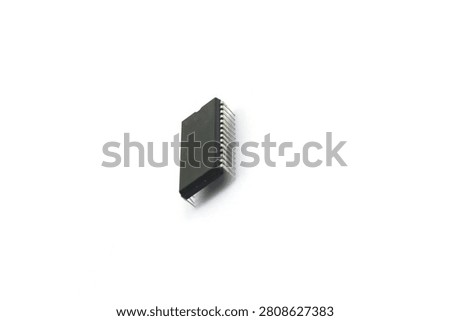 A blurry microcontroller on a white background. An archaic concept of technological advancement.