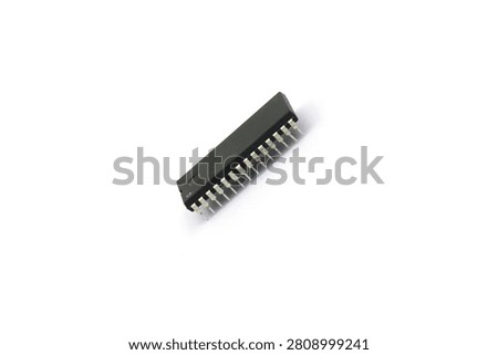 A blurry microcontroller on a white background. An archaic concept of technological advancement.