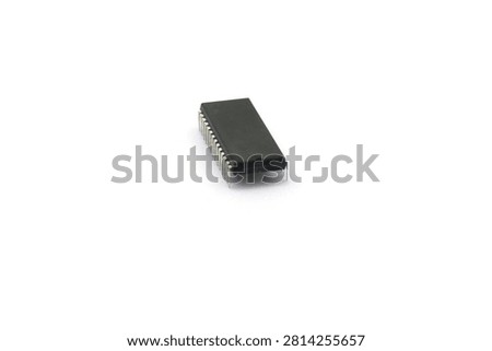 A blurry microcontroller on a white background. An archaic concept of technological advancement.