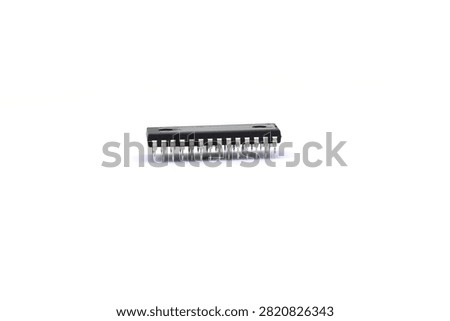 A blurry microcontroller on a white background. An archaic concept of technological advancement.