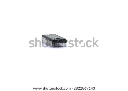 A blurry microcontroller on a white background. An archaic concept of technological advancement.