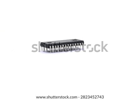 A blurry microcontroller on a white background. An archaic concept of technological advancement.