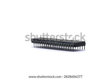 A blurry microcontroller on a white background. An archaic concept of technological advancement.