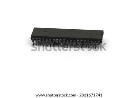 A blurry microcontroller on a white background. An archaic concept of technological advancement.