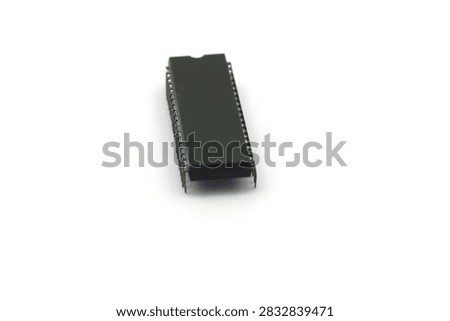 A blurry microcontroller on a white background. An archaic concept of technological advancement.
