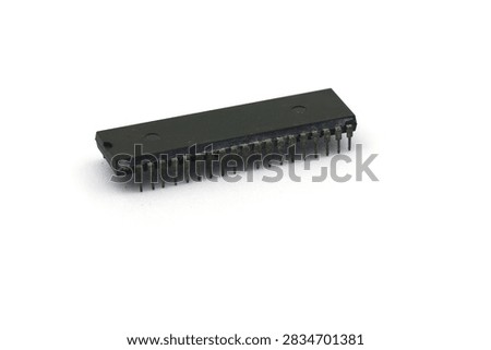 A blurry microcontroller on a white background. An archaic concept of technological advancement.