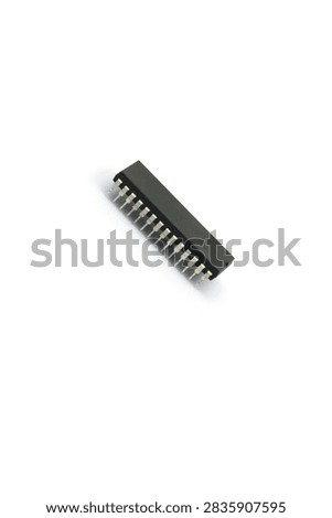 A blurry microcontroller on a white background. An archaic concept of technological advancement.
