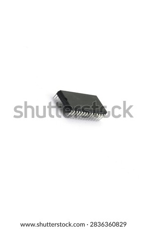 A blurry microcontroller on a white background. An archaic concept of technological advancement.