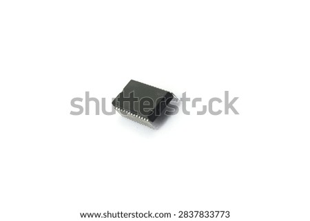 A blurry microcontroller on a white background. An archaic concept of technological advancement.