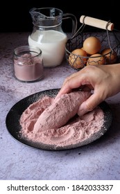 Blurry Motion Of Coating Korean Sweet Potato Bread Made From Sweet Potato Flour, Milk, Sticky Flour, Cheese. Selective Focus, Grainy Texture.