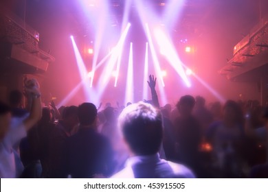 Blurry Night Club Dj Party People Enjoy Of Music Dancing Sound With Colorful Light. Club Night Light Dj Party Bangkok RCA Thailand.