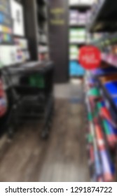 Blurry Office Supply Store With Shopping Carts 