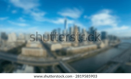 A blurry out of focus high angle shot of the London cityscape featuring historic buildings and the river