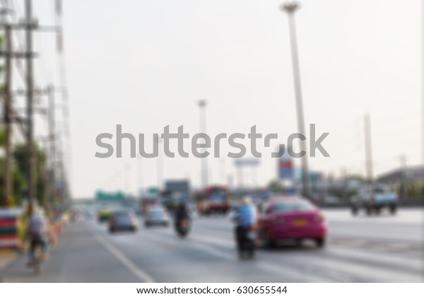 The blurry picture of traffic\
direction to the city, urban area close to the big city,\
Thailand