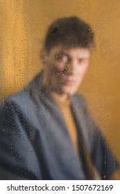 Blurry Portrait Of Man Looking At Camera