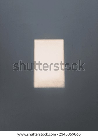 Blurry Reflection On The Wall From The Windowpane.