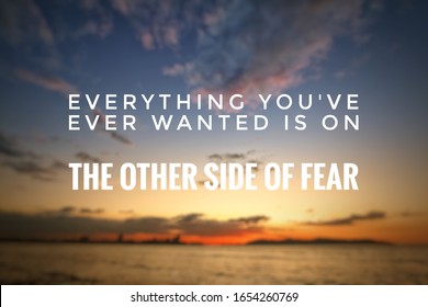 Blurry seascape with Inspirational quote - Everything you've ever wanted is on the other side of fear