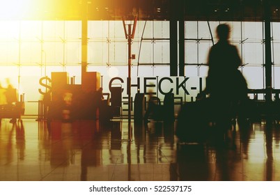 Blurry Silhouette Busy Airport Terminal - Transportation Concept