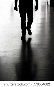 Blurry Silhouette O And Shadow Of A Man In City Passage Alley In Black And White