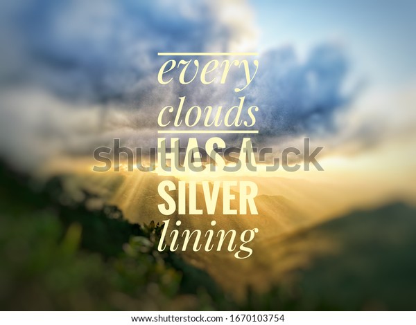 blurry skies background with inspirational\
quote - every clouds has a silver\
lining