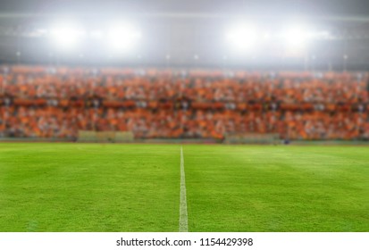 Blurry And Soft Focus Of Football Stadium And Arena Soccer Field Championship Win For Background