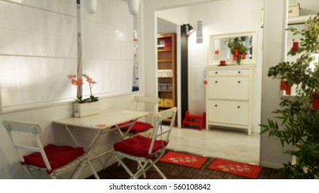 Blurry and soft focus of living room kitchen and dining room interior