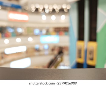 Blurry view from an elevated position overlooking a bustling Hong Kong shopping mall.  Bright lights, shops, and shoppers are visible, creating a vibrant yet indistinct scene.