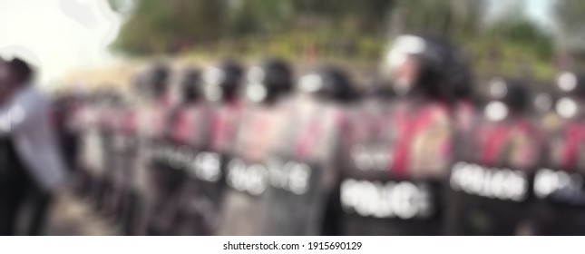 Blurry View Of Myanmar People Protesters Chanting Slogans During The Demonstrations. Police Blocked Every Junction To The Mandalay Palace And Mandalay Moat As Most Citizens Protested The Military Coup