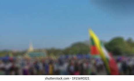 Blurry View Of Myanmar People Protesters Chanting Slogans During The Demonstrations. Police Blocked Every Junction To The Mandalay Palace And Mandalay Moat As Most Citizens Protested The Military Coup