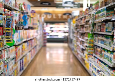 Blurry View Of A Supermarket Aisle