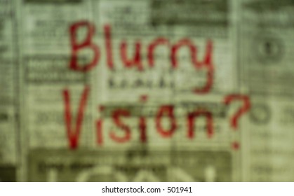 Blurry Vision Written On Newspaper