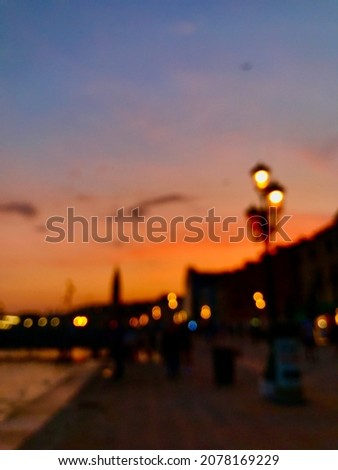 Blury sunset over the city of Venice, Italy