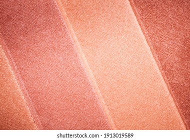 Blusher or bronzer shimmering palette texture pressed background