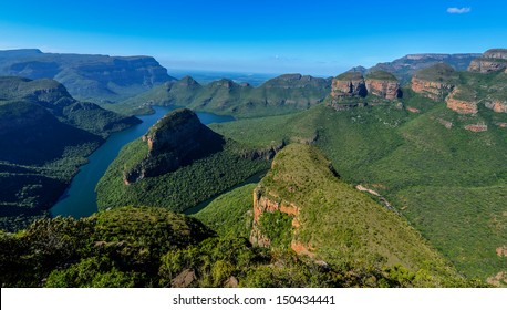 Blyde River Canyon and The Three Rondavels (Three Sisters) in Mpumalanga, South Africa. The Blyde River Canyon is the third largest canyon worldwide - Powered by Shutterstock