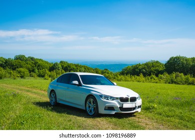 Bmw 3 Series On The Background Of Mountains And Nature