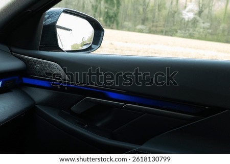BMW 550 e plug-in hybrid door, rearview mirror with Bowers and Wilkins speakers