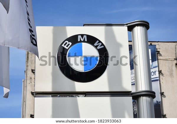 BMW sign, logo, emblem at BMW dealer salon. WARSAW,\
POLAND - AUGUST 2, 2020