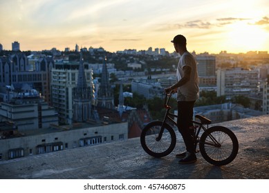 Bmx freestyle. Standing with his bmx. - Powered by Shutterstock