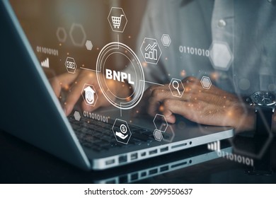 BNPL Buy now pay later online shopping concept. Businessmen using a computer to BNPL with online shopping icons technology. - Shutterstock ID 2099550637