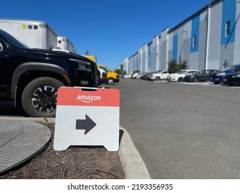 Board With Amazon Logo, Smile Symbol And Pointing Arrow At The Street. Everett, WA, USA - August 2022