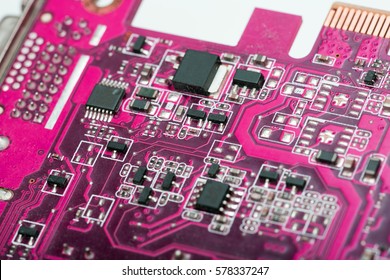 Board with components and chips. Fantasy color. Technology with fantasy colored chipset and board. Pink board.