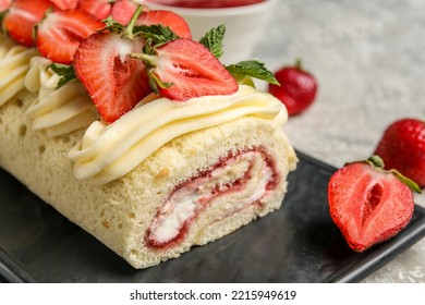 Board With Delicious Strawberry Roll Cake, Closeup