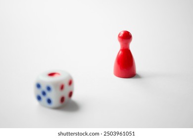 Board game piece and dices - Powered by Shutterstock