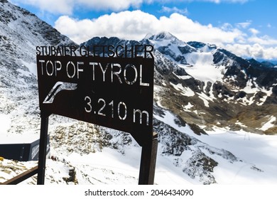 Board located in Austria at Top of Tyrol at 3.210 meters. Touristic place where you can see 50 peaks from the Austrian Alps. The sign reads "Stubaier Gletscher", which means Stubai Glacier in german.