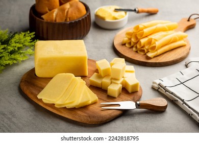 board with mozzarella cheese with bread