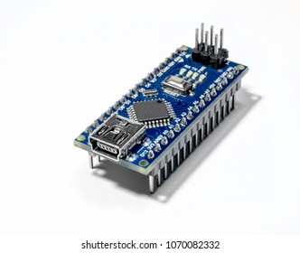 Board for prototyping Arduino Nano  isolated on white background.  The brain for robots. Arduino Board for engineering prototyping in fablab