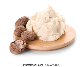 Board with shea butter on white background